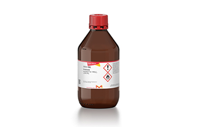 Acetone The image is of a a brown plastic bottle with a red cap and a white label, which contains Acetone.