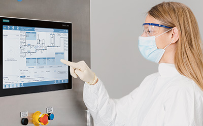 CCP® control software Scientist at a CoPrime Biochromatography unit operation using the HMI to interact with CCP® control software to adjust the system's parameters.