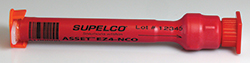 asset-ez4-nco A red cylindrical object with black measurement markings. It is labeled “SUPELCO” along with “Lot 12345” and “ASSET FRANCE”.