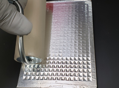 Aluminum Adhesive Seals for SMC® Assay Plates Image of the aluminum adhesive seal needed for SMC® assay plates read on FemtoQuest™ instruments. Do NOT use clear acrylic seals to seal loaded read plates because they do not protect against light.