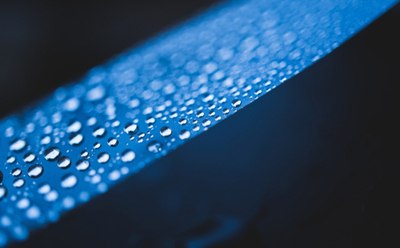 Water droplets on blue superhydrophobic polymer