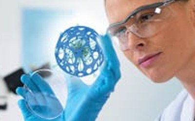 Scientist using chemical biology tools in research lab