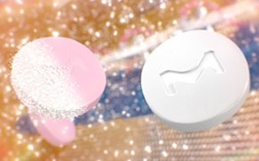 Pink tablets in the process of being coated with a white film coating. Pink tablets in the process of being coated with a white film coating.