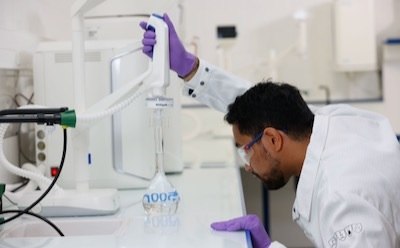 Scientist operates MilliQ