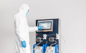 Control and monitor bioprocess unit operations using Bio4C ACE™ Software Scientist in bunny suit using Bio4C ACE™ software on the Mobius® Cell Retention System.