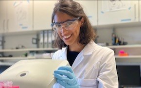 Lang lab tile Lang looks at camera while working in the lab.