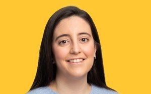 Maria Vivero-Lopez headshot on a vibrant yellow background