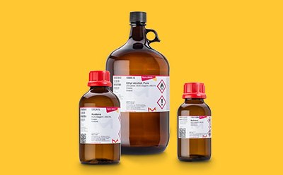 三只Sigma-Aldrich®玻璃瓶置于黄色背景上。